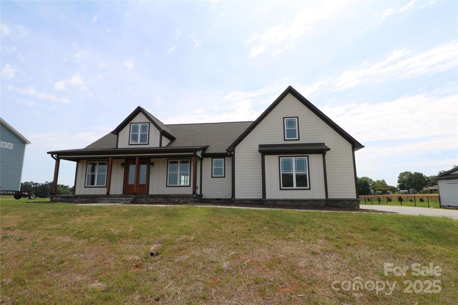 Front exterior of a new home in , Salisbury, NC, highlighting curb appeal (Image 24).