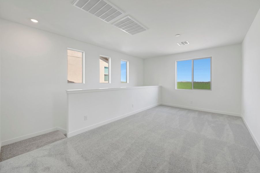 Spacious, unfurnished interior of a new home in Soleo, San Tan Valley (Image 28).