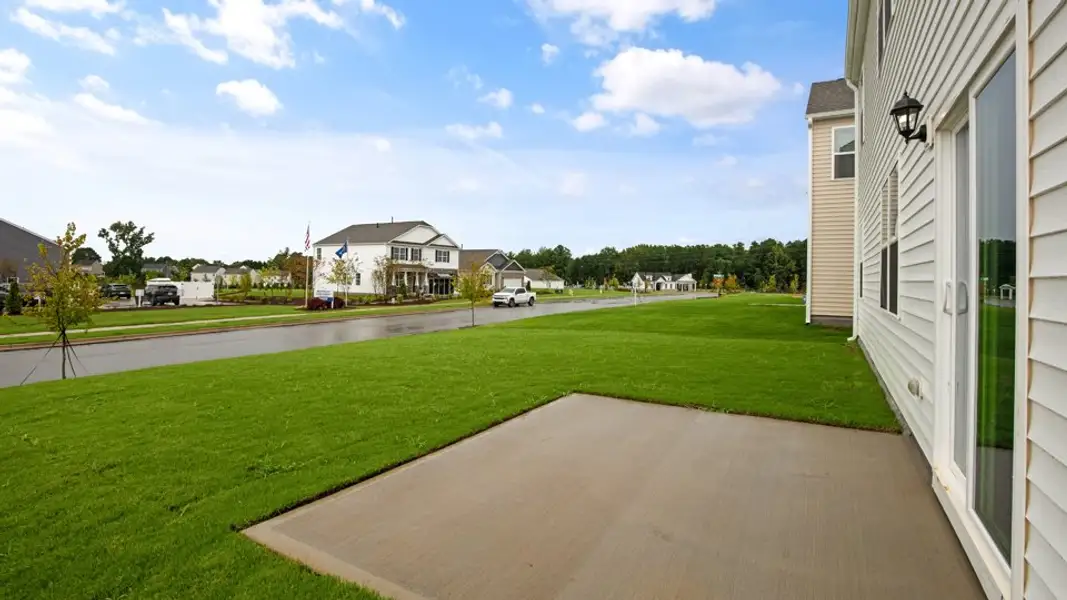 Exterior details and patio area of a home in The Reserve at Prestleigh, Wake Forest (Image 3).