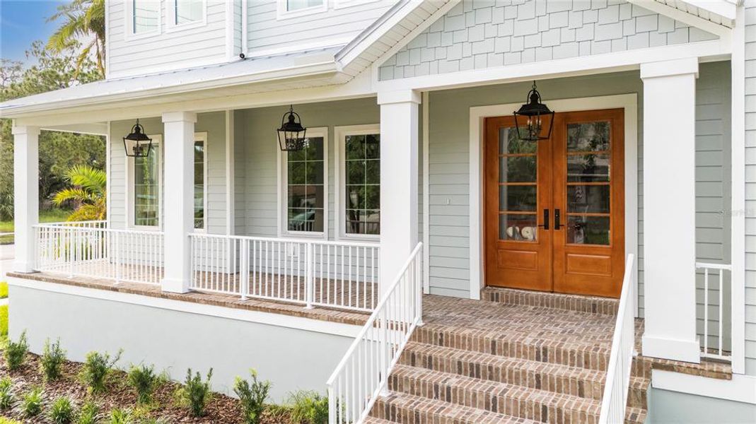Front exterior of a new home in , Tampa, FL, highlighting curb appeal (Image 24). Front exterior of a new home in , Tampa, FL, highlighting curb appeal (Image 24).
