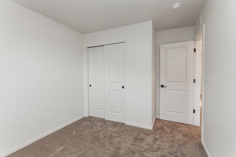 Representative unfurnished interior of a home built from the Sage by Hartford Homes in Bloom, Fort Collins (Image 41).