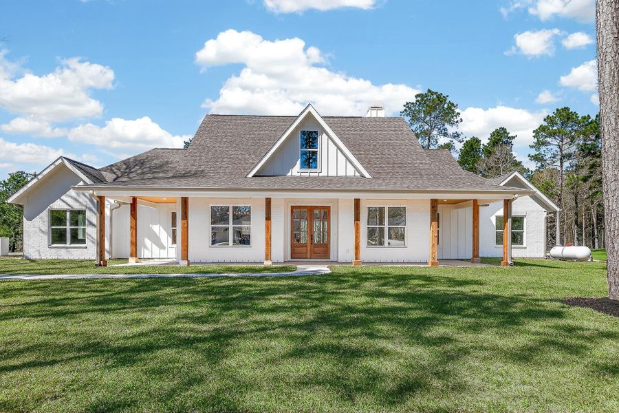 Exterior details and patio area of a home in , Splendora (Image 31).