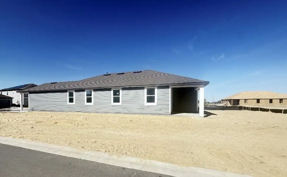 Exterior details and patio area of a home in Trailside, Mount Dora (Image 4).