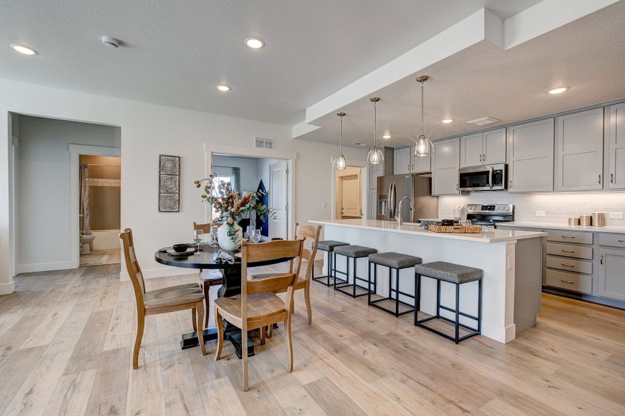 Representative furnished interior of a home built from the The Cambridge by Landmark Homes in The Lakes at Centerra, Loveland (Image 7).
