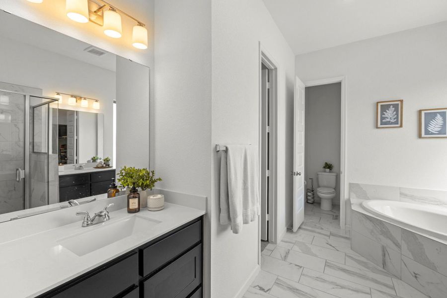 Furnished interior view inside a new home in Parkside on the River, Georgetown (Image 14).