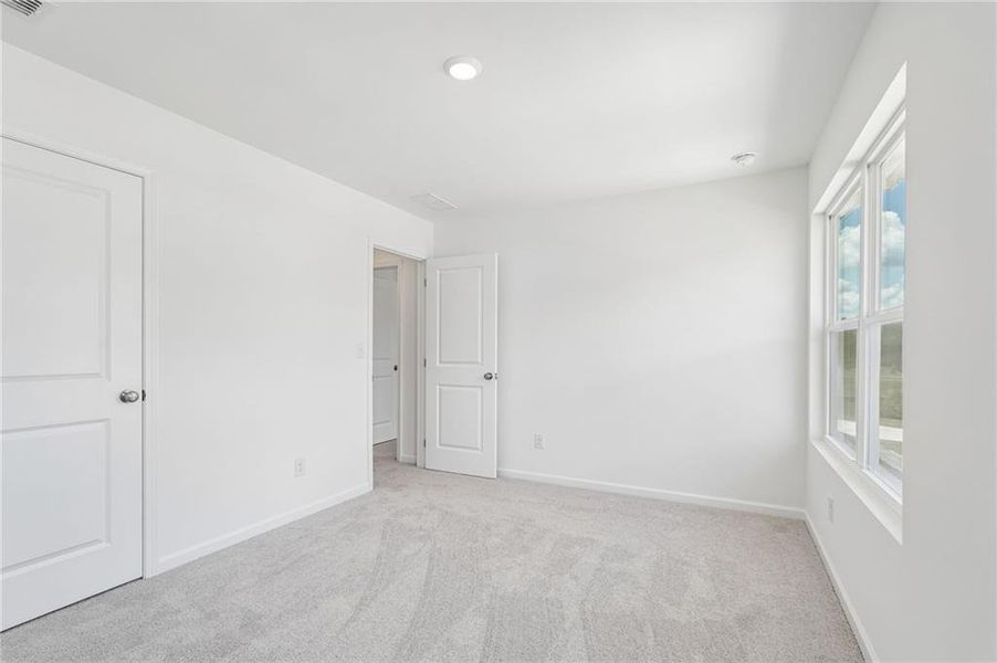 Spacious, unfurnished interior of a new home in Heritage River, Euharlee (Image 46).