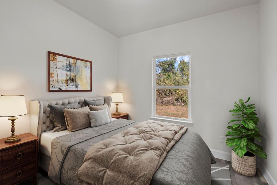 Virtually Staged: Secondary Bedroom with vinyl floors, and neutral paint.