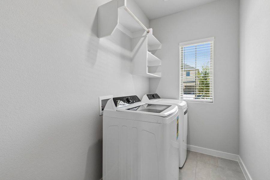 Utility Room in the Cypress home plan by Trophy Signature Homes - REPRESENTATIVE PHOTO