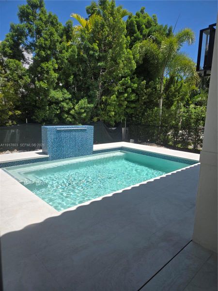 Exterior details and patio area of a home in , Coral Gables (Image 3).
