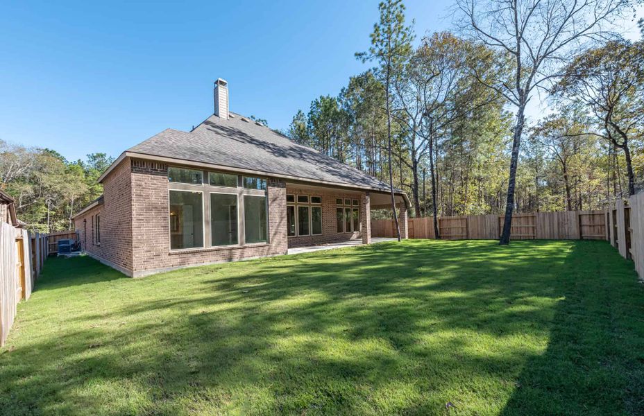 Representative exterior details of a home built from the 3358 by Ravenna Homes in Artavia 70′, Conroe (Image 27).