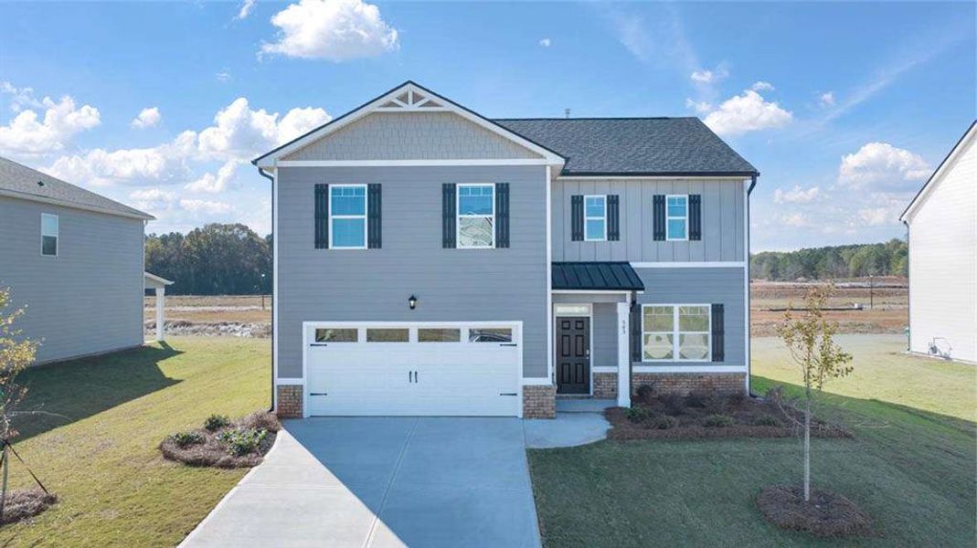 Front exterior of a new home in Cedar Ridge - Locust Grove Station, Locust Grove, GA, highlighting curb appeal (Image 2). Front exterior of a new home in Cedar Ridge - Locust Grove Station, Locust Grove, GA, highlighting curb appeal (Image 2).