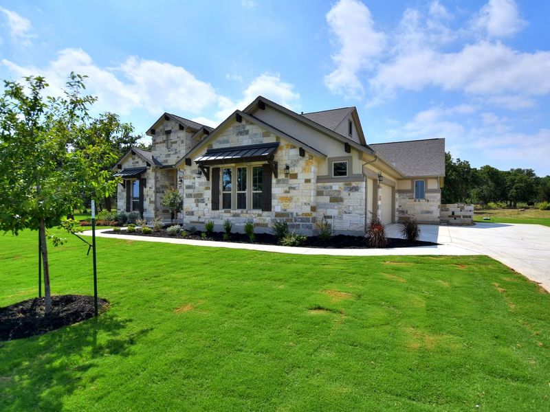 Representative exterior photo of a completed home built from the San Simeon I by Giddens Homes in Clearwater Ranch, Liberty Hill, TX (Image 39).