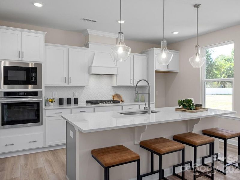 Furnished interior view inside a new home in Enclave at Belmont, Belmont (Image 3).