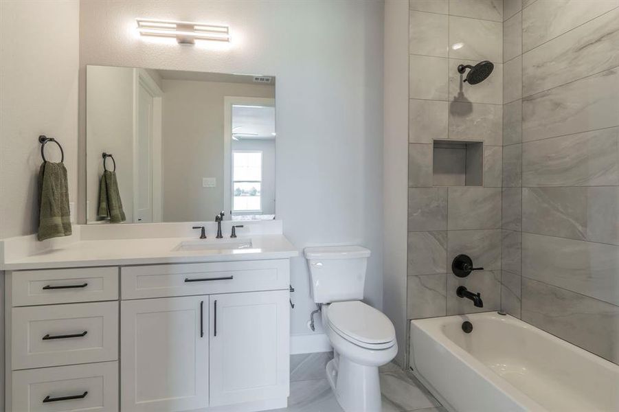 Full bath with vanity and shower / bath combination Full bath with vanity and shower / bath combination