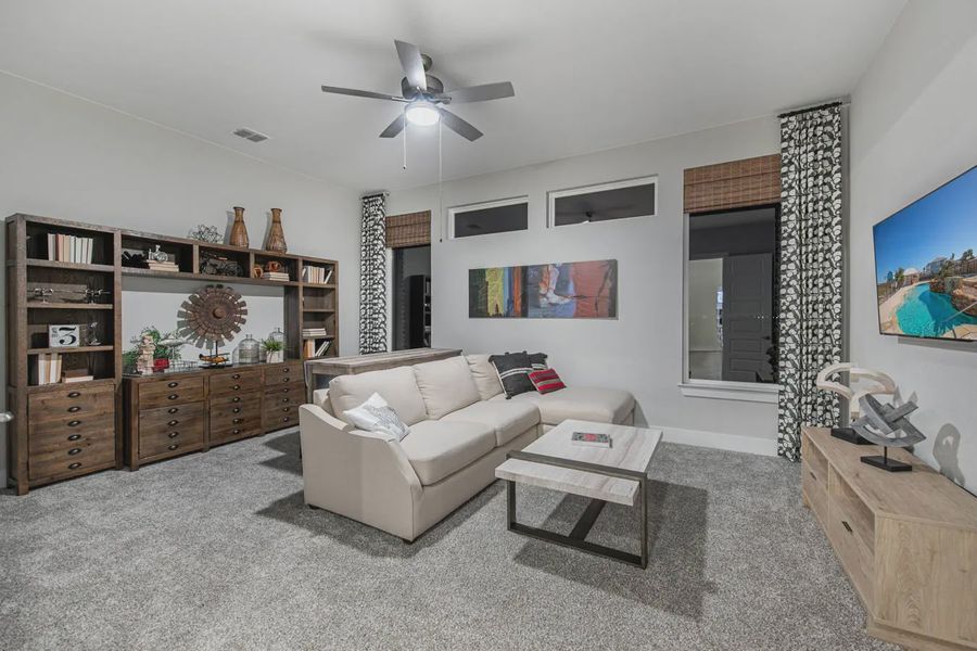 Representative furnished interior of a home built from the Gregory by Chesmar Homes in Potranco Oaks 100's, Castroville (Image 12).