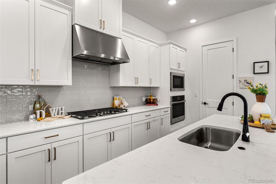 Furnished interior view inside a new home in Wolf Ranch - Enclave Collection, Colorado Springs (Image 11).