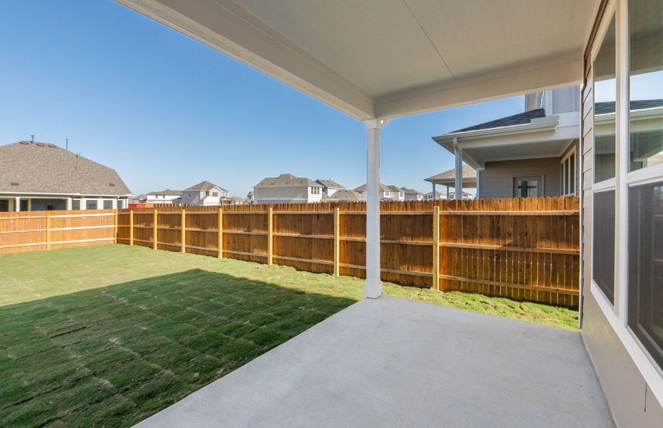 Exterior details and patio area of a home in Santa Rita Ranch, Liberty Hill (Image 27).