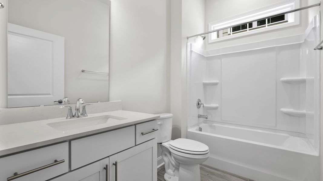 Furnished interior view inside a new home in The Villas at Kinsley, Jamestown (Image 4).