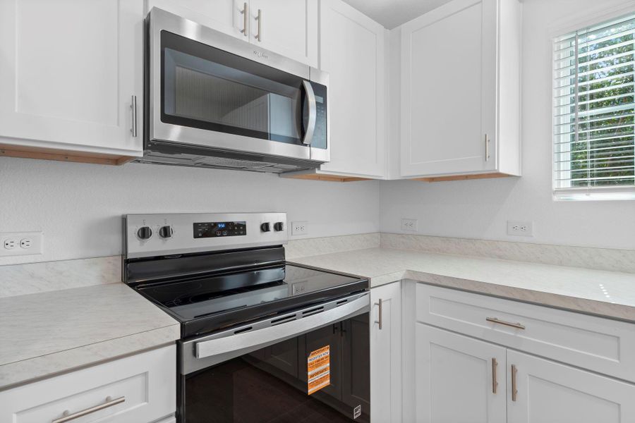 Close-up of interior finishes inside a home in The Courtyards at Stokesbury, Waller (Image 10).