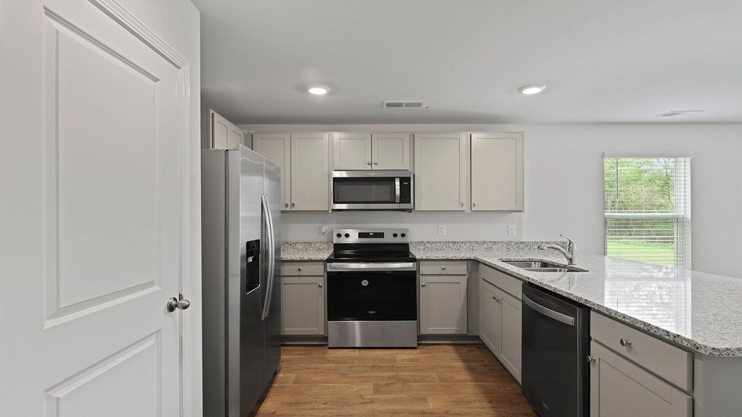 Furnished interior view inside a new home in Center Pointe, Santee (Image 4).