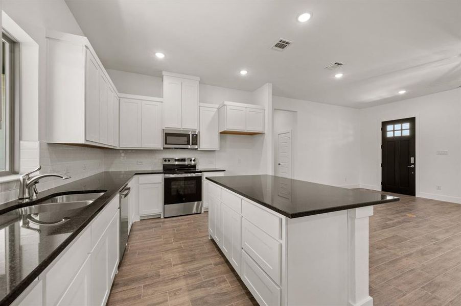 Furnished interior view inside a new home in Saddleback Estates, Boyd (Image 5).