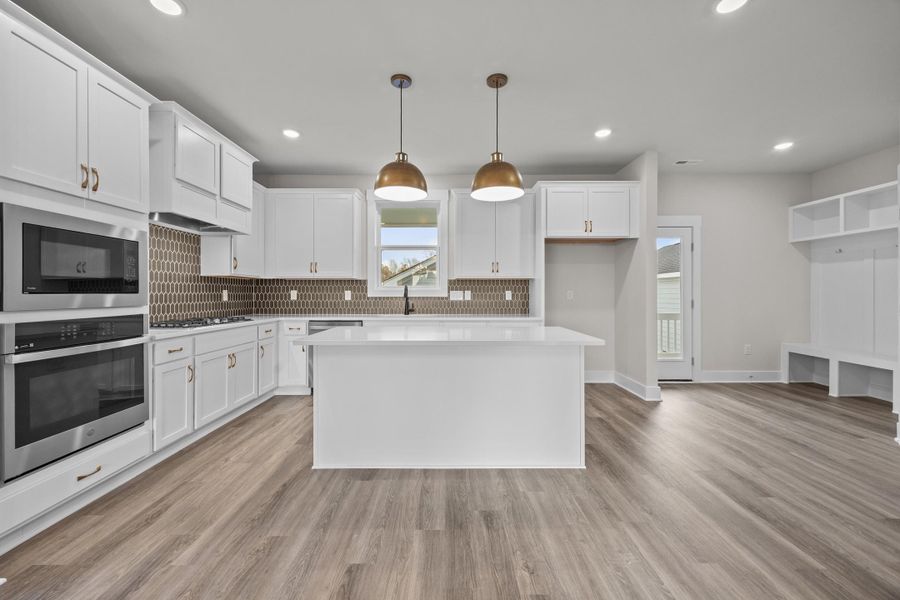 Representative furnished interior of a home built from the Southbound Train by Garman Homes in Wendell Falls, Wendell (Image 8).