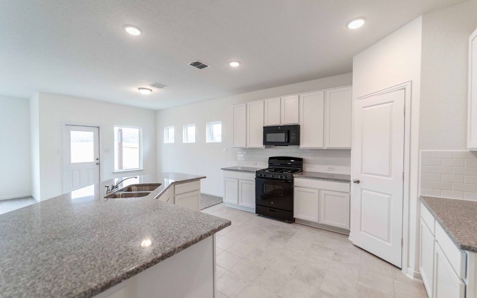 Furnished interior view inside a new home in Hunter's Ranch, San Antonio (Image 3).