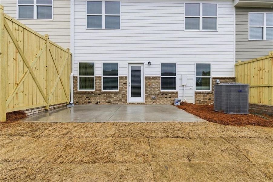 Exterior details and patio area of a home in Park Center Pointe, Mableton (Image 22).