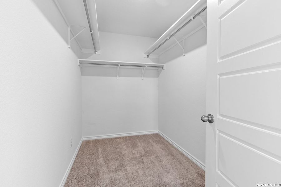 Spacious, unfurnished interior of a new home in Hidden Bluffs at TRP, San Antonio (Image 25).