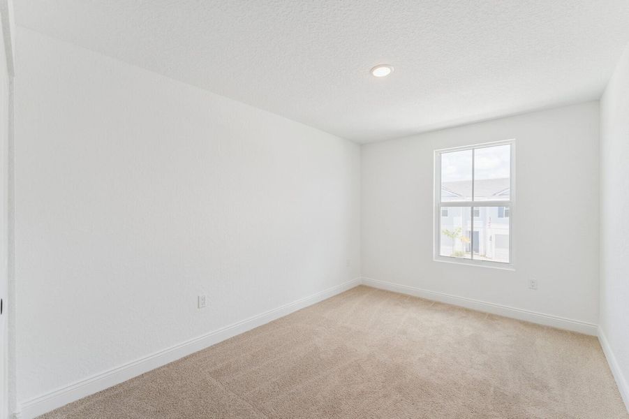 Furnished interior view inside a new home in Salerno Reserve Townhomes, Stuart (Image 11).