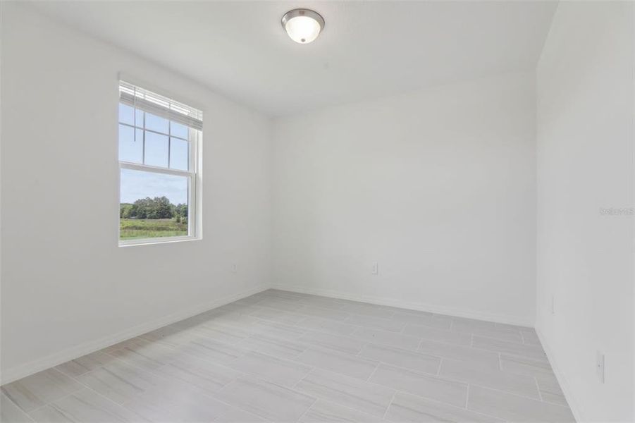 Spacious, unfurnished interior of a new home in Springs at Lake Alfred - Signature Series, Lake Alfred (Image 21).