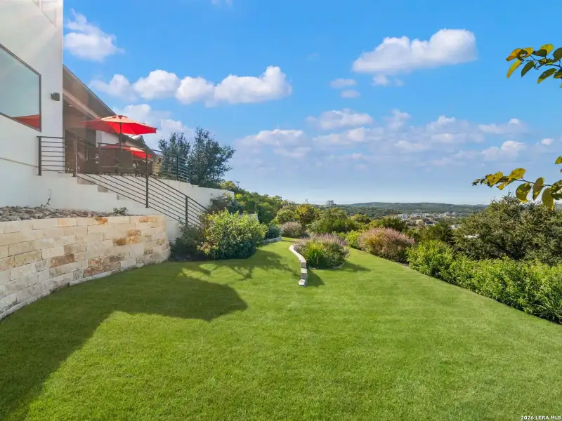 Exterior details and patio area of a home in , San Antonio (Image 31).