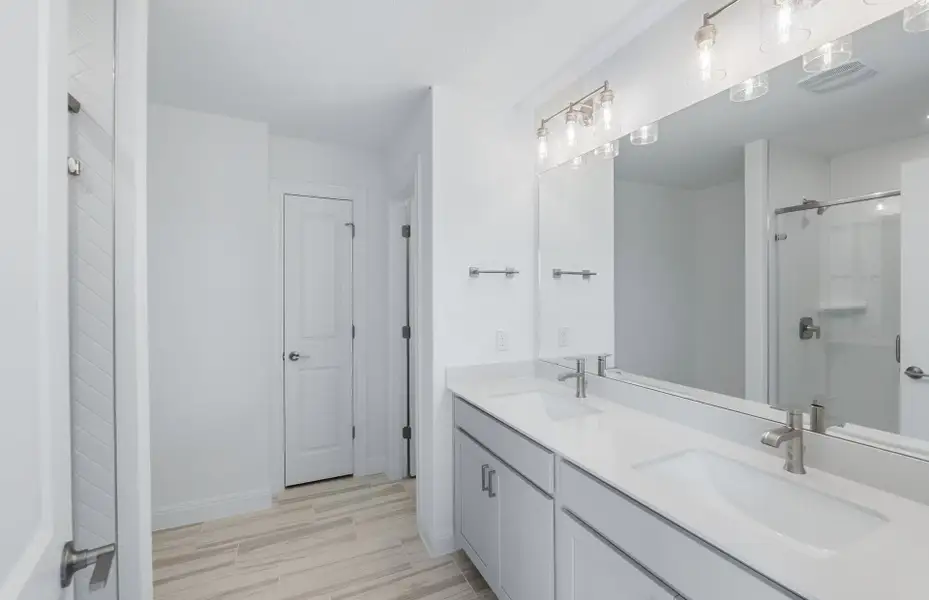 Furnished interior view inside a new home in Saddleback at Santa Rita Ranch, Liberty Hill (Image 7). Furnished interior view inside a new home in Saddleback at Santa Rita Ranch, Liberty Hill (Image 7).