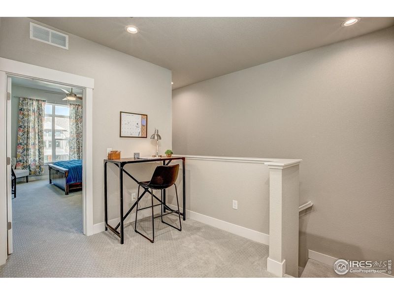 Furnished interior view inside a new home in Highlands at Fox Hill - The Towns, Longmont (Image 12).