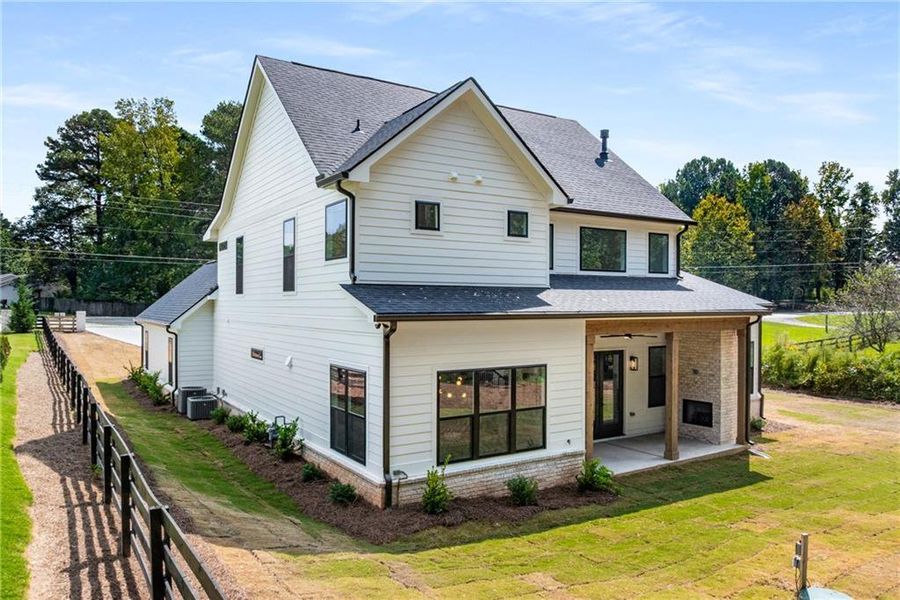 Front exterior of a new home in , Alpharetta, GA, highlighting curb appeal (Image 2). Front exterior of a new home in , Alpharetta, GA, highlighting curb appeal (Image 2).