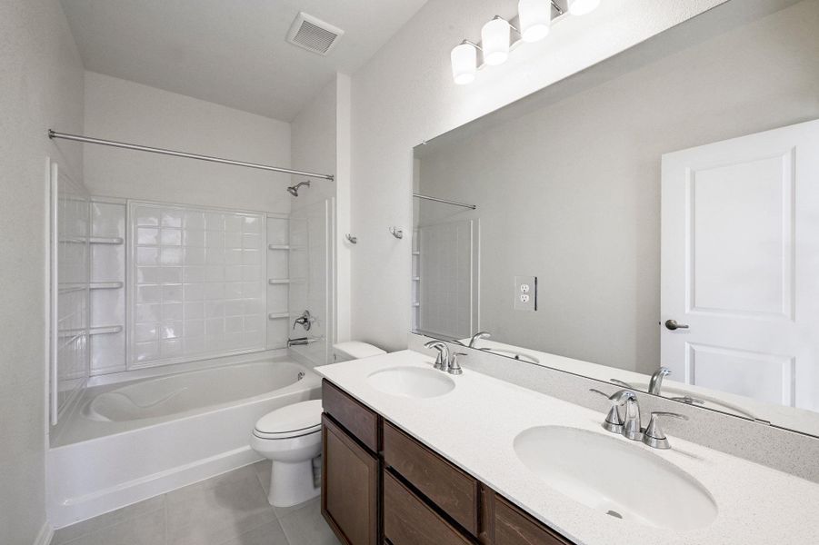 Furnished interior view inside a new home in Creekside at Estancia, Austin (Image 9).