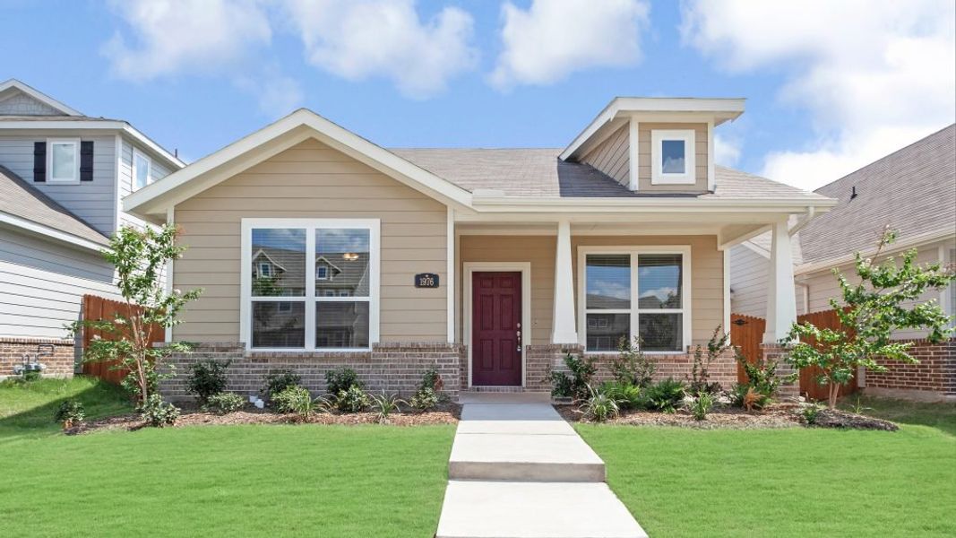 Representative exterior photo of a completed home built from the Bastrop by Impression Homes in Heartland, Heartland, TX (Image 1).