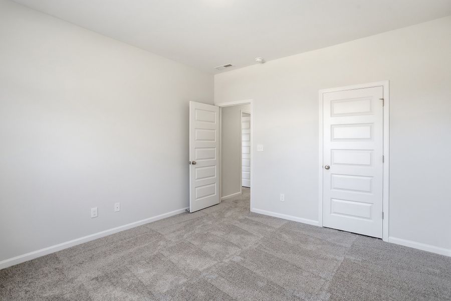 Spacious, unfurnished interior of a new home in Ovation at Sweetbrier, Durham (Image 30).