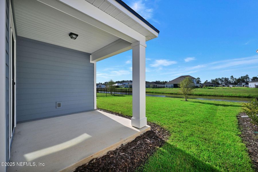 Front exterior of a new home in Hyland Trail, Green Cove Springs, FL, highlighting curb appeal (Image 16). Front exterior of a new home in Hyland Trail, Green Cove Springs, FL, highlighting curb appeal (Image 16).
