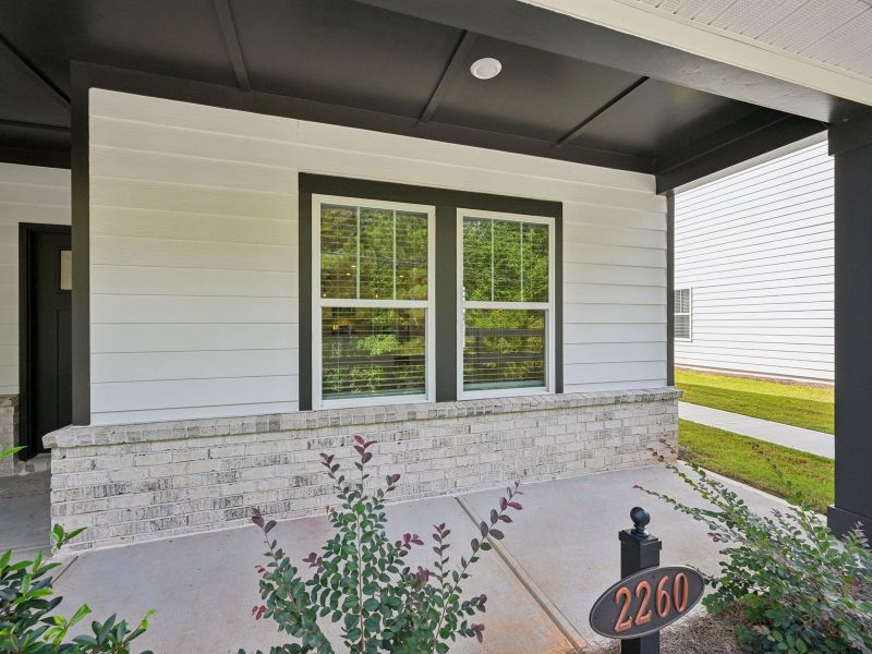 Front exterior of a new home in Avalon - Vista Series, Conyers, GA, highlighting curb appeal (Image 1).