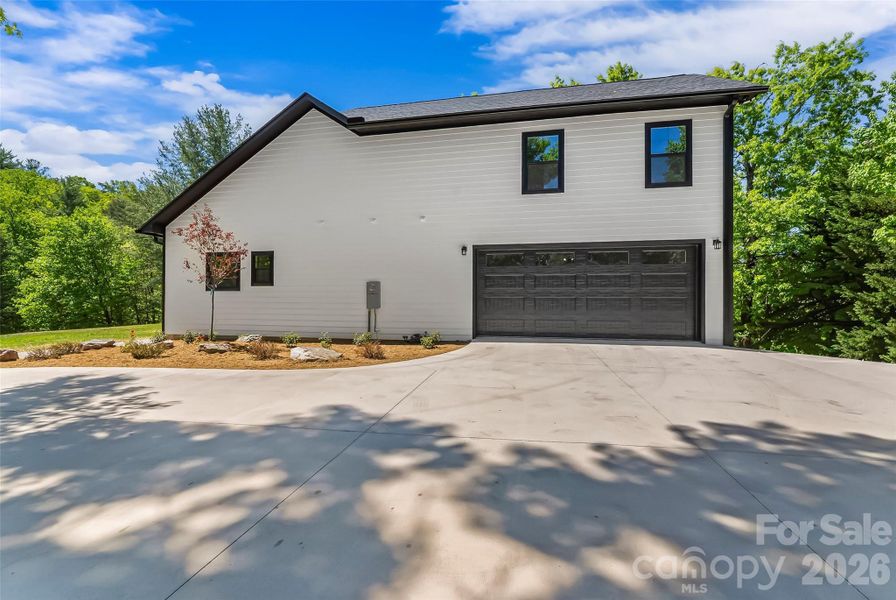 Front exterior of a new home in , Marion, NC, highlighting curb appeal (Image 23).