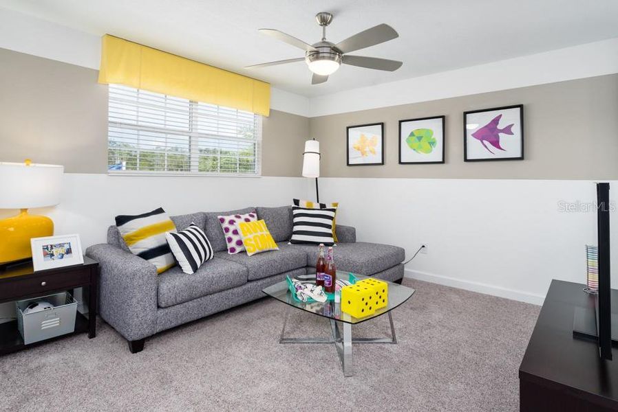 Furnished interior view inside a new home in Wellness Ridge, Clermont (Image 5).