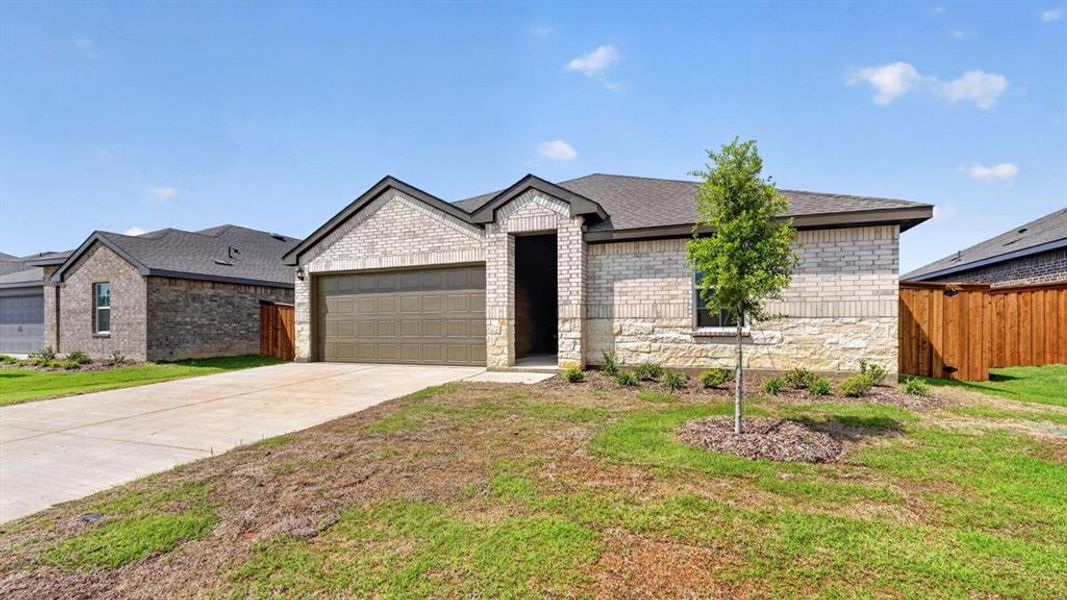 Front exterior of a new home in Forestbrook Estates, Paris, TX, highlighting curb appeal (Image 23).