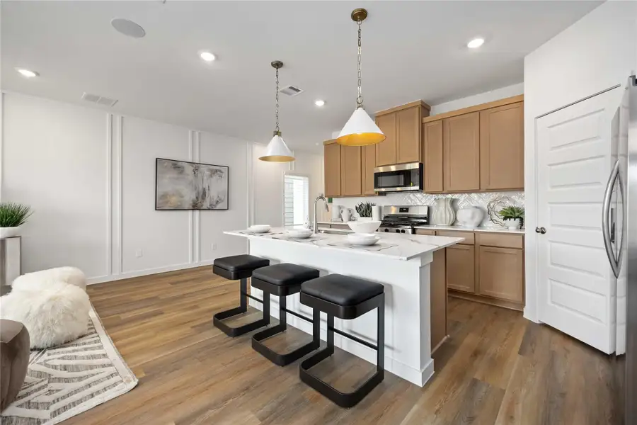Furnished interior view inside a new home in Grand West, Houston (Image 8).