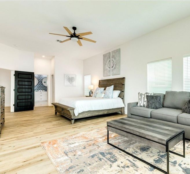 Spacious, comfortable primary suite with sitting area