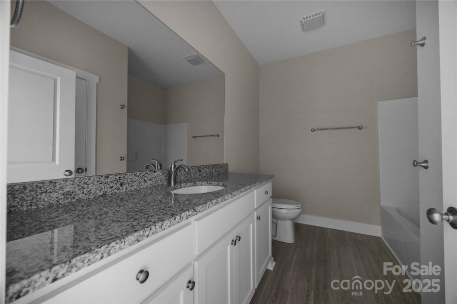 Furnished interior view inside a new home in , Mocksville (Image 8).