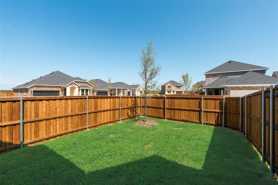 Front exterior of a new home in Arbors at Legacy Hills, Celina, TX, highlighting curb appeal (Image 1).