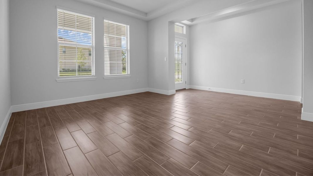 Representative unfurnished interior of a home built from the Torrey by D.R. Horton in Waterleigh, Winter Garden (Image 12).