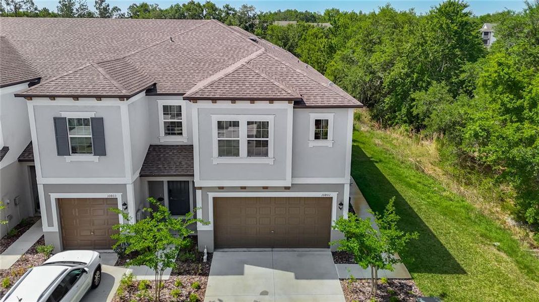 Front exterior of a new home in , Tampa, FL, highlighting curb appeal (Image 26).