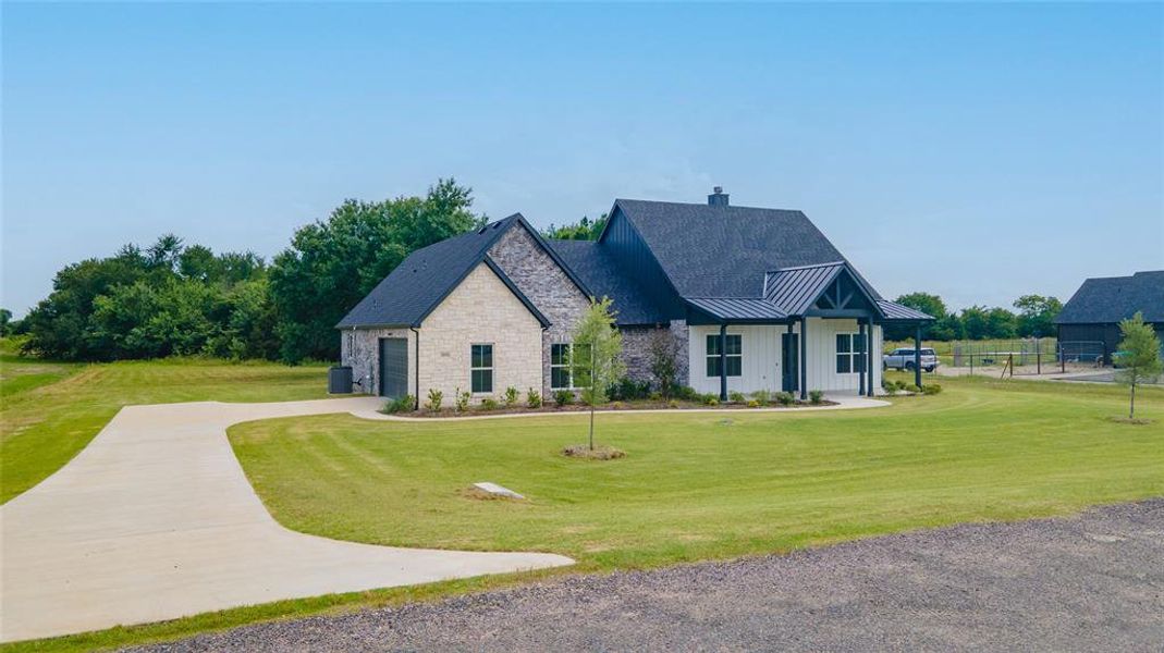 Front exterior of a new home in , Celeste, TX, highlighting curb appeal (Image 23). Front exterior of a new home in , Celeste, TX, highlighting curb appeal (Image 23).